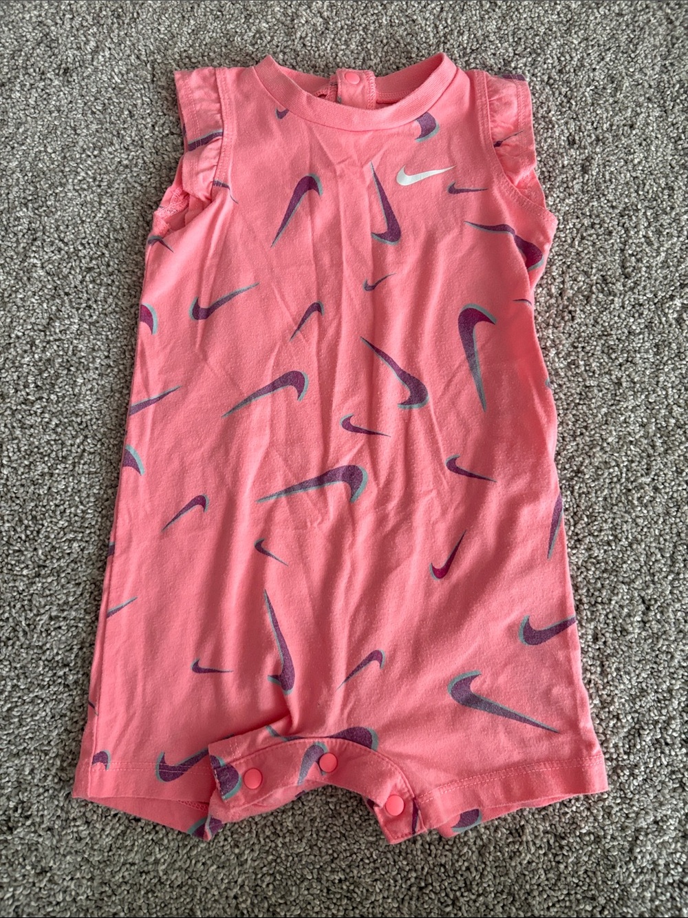 Nike infant girls Pink Swoosh Allover Infant Romper 9 months